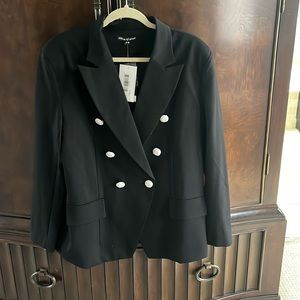 Black double breasted blazer with gold buttons.